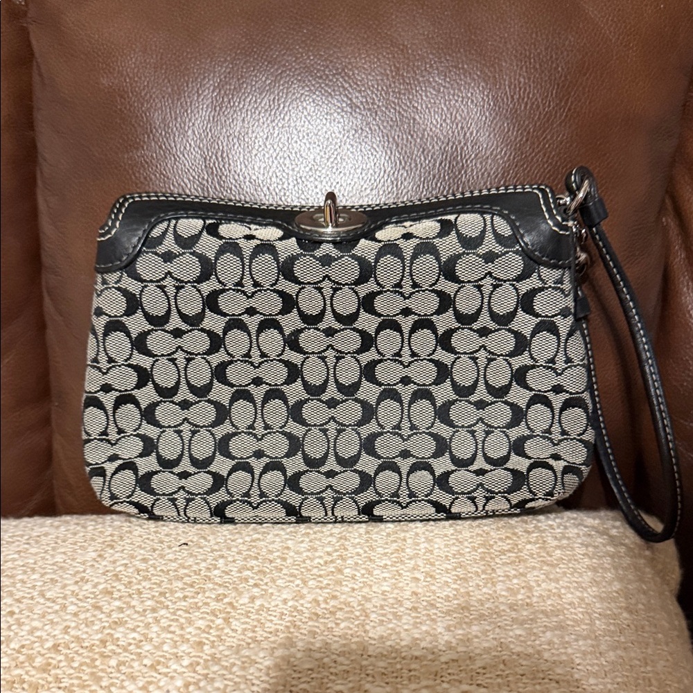Coach Black and Tan Signature Clutch